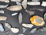 many different types of rocks and stones on the table