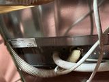 a close up view of a machine with wires and wires