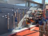 many tools hanging on the wall in the store