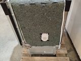 a large gray box sitting on top of a wooden pallet