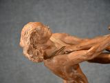 a statue of a man and a woman holding each other