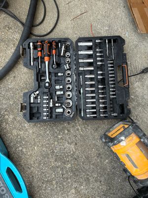 many tools that are laying out on the ground