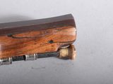 a close up of a wooden object on a table