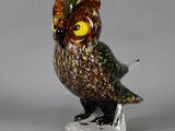 an image of a glass owl figurine on a clear base