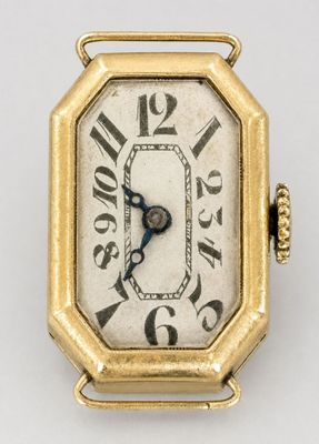 an image of a gold watch with roman numerals on the face