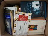 a box full of books that are sitting on a table