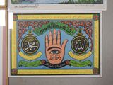 two pictures of a hand and a hand with arabic writing on them