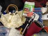 many items that are sitting on top of a bag