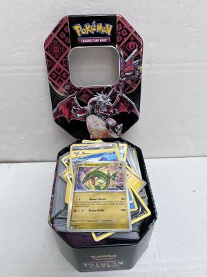 a box of pokemon cards sitting on top of a table