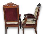 pair of antique chairs with red velvet upholstered seats