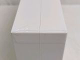 a close up of a white box sitting on top of a table