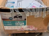 a cart with a bunch of electronic equipment inside of it