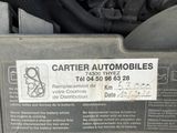 an image of a car engine with a label on it