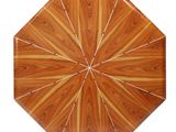 an image of a wooden table with a circular design on top of it
