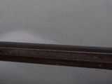 a close up of a pair of scissors on a table
