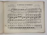 an old book with a page of music written in it