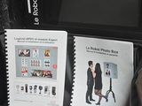 a black suitcase that has some books inside of it