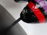 a close up of a colorful candy on a stick