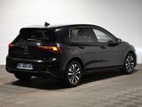 the rear end of a black volkswagen e - golf parked in a garage