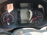 a close up of a car dashboard with various gauges