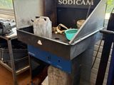 an image of a kitchen area with a sink and a stove