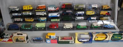 a lot of toy trucks that are on the table