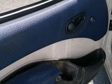 a car door with the door handle missing
