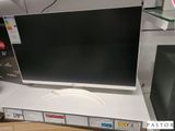 une photo d'un téléviseur posé sur une table