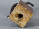 an image of a small piece of wood with a hole in it