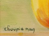 an oil painting of an orange on a green background with the word ' chuppie mag ' written on it