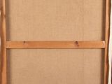 an oil painting of a cat sitting on top of a wooden easel