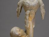 statue of a woman holding a child in her arms