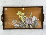 a picture of a painting of flowers on a wooden tray