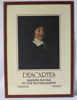 portrait encadré d'un homme moustachu dans un cadre marron