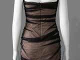 a brown and black dress on a mannequin mannequin mannequin mannequin mannequin mannequin mannequin mannequin mann