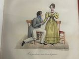 an old book with a picture of a man and a woman sitting on a chair