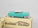 a toy car that is sitting on top of a box