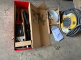 a box that has some tools in it on the ground