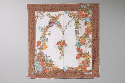 an old handkerchief hanging on a wall in a room