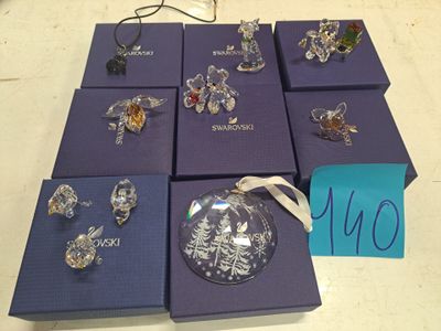 many different types of jewelry on display on the table