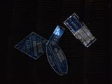 three street signs that are laying on the ground
