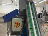 a picture of a conveyor belt in a factory