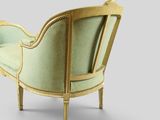 an image of a chair with a green upholstered back