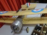 a model airplane that is sitting on a table