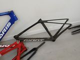 a bike that is laying on the floor next to a wall