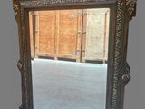 a mirror that is sitting on a table