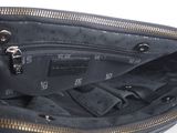 a black purse with a zipper on the inside of it