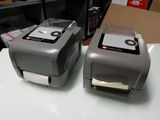 two machines that are sitting on a table