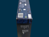a black box that has a blue label on it