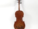 an old violin with a wooden case and a wooden bow